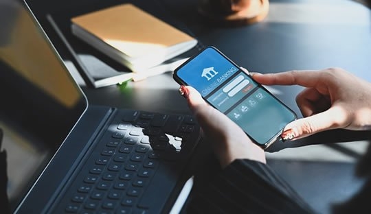 What is a minimum balance and fall-below fee, and when do they matter?